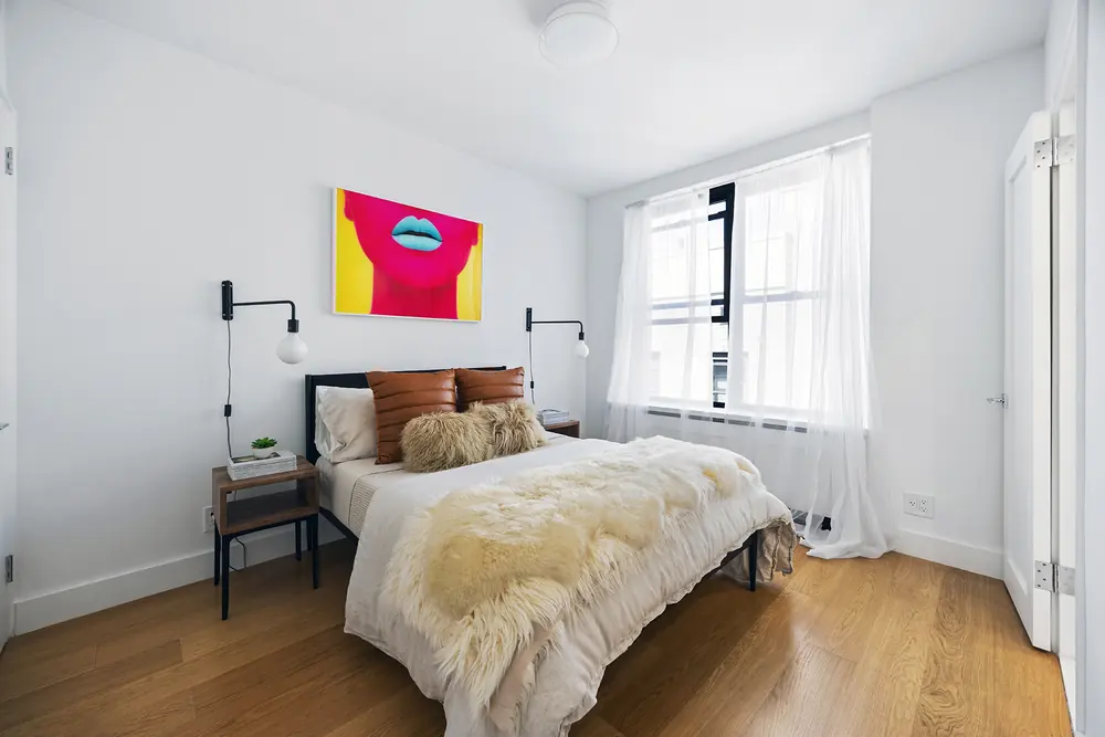 425 Central Park West, Residence 7CD: the primary bedroom in a calm, layered palette